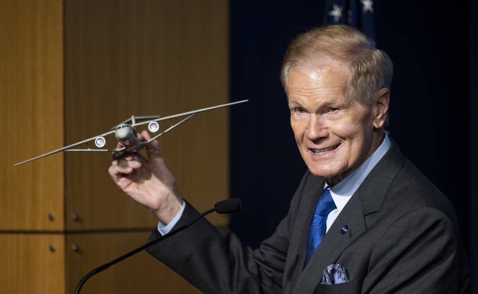 NASA Administrator Bill Nelson holds a model of an aircraft with a Transonic Truss-Braced Wing during a news conference on NASA’s Sustainable Flight Demonstrator project, Wednesday, Jan. 18, 2023, at the Mary W. Jackson NASA Headquarters building in Washington, DC.  Through a Funded Space Act Agreement, The Boeing company and its industry team will collaborate with NASA to develop and flight-test a full-scale Transonic Truss-Braced Wing demonstrator aircraft. Photo Credit: (NASA/Joel Kowsky)